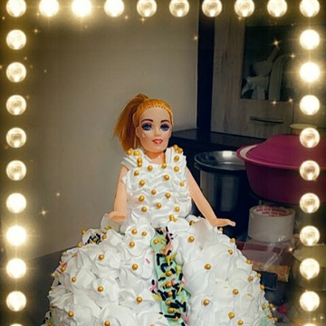 Doll-themed cake